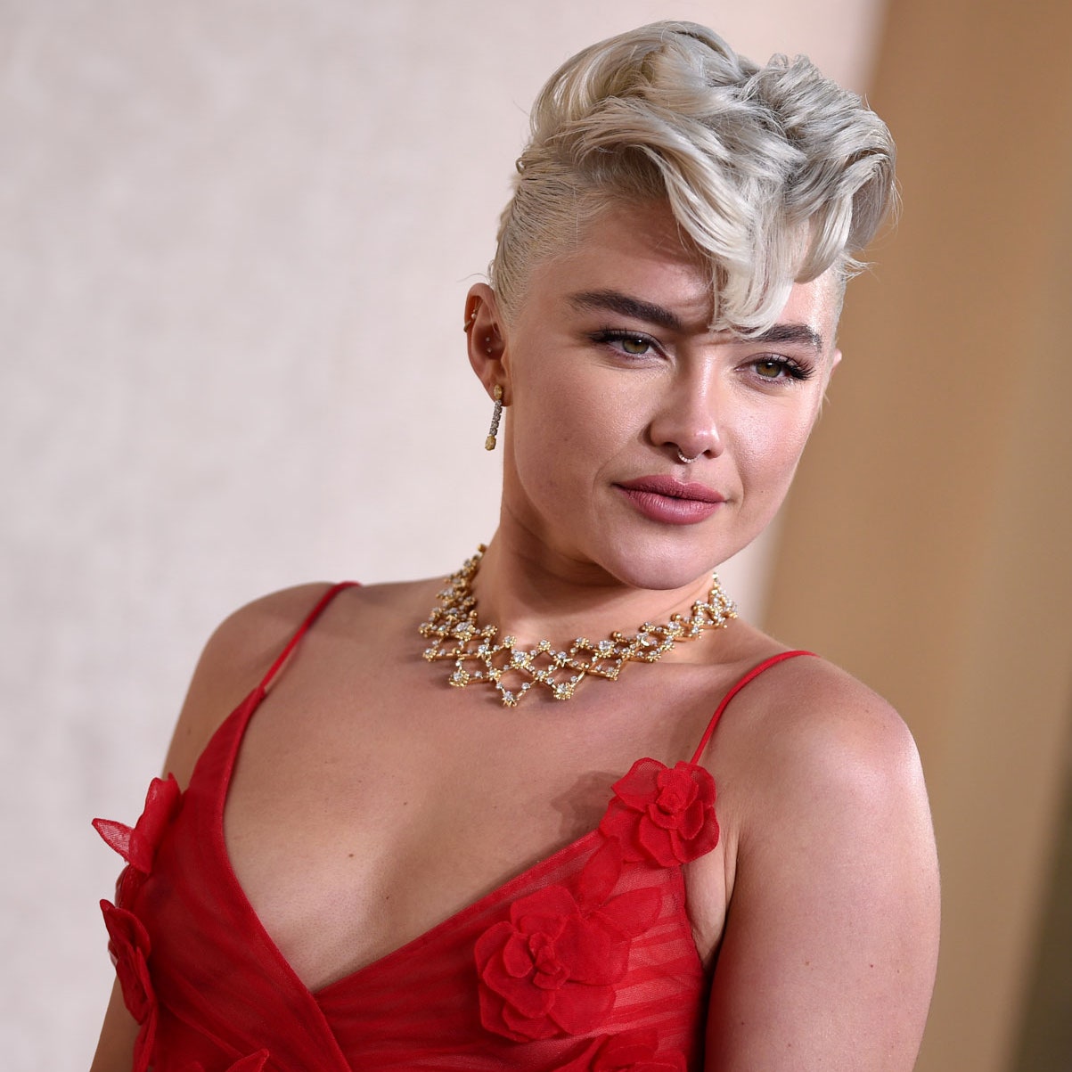 Florence Pugh wore the tallest platforms I've ever seen to the Golden Globes