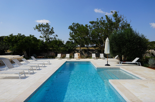 Masseria Gemmabella  This sprawling complex  which comprises a main masseria and multiple trulli  has the Alist seal of...
